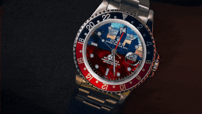 Rolex GMT-Master II with dual time zone display and rotating 24-hour bezel