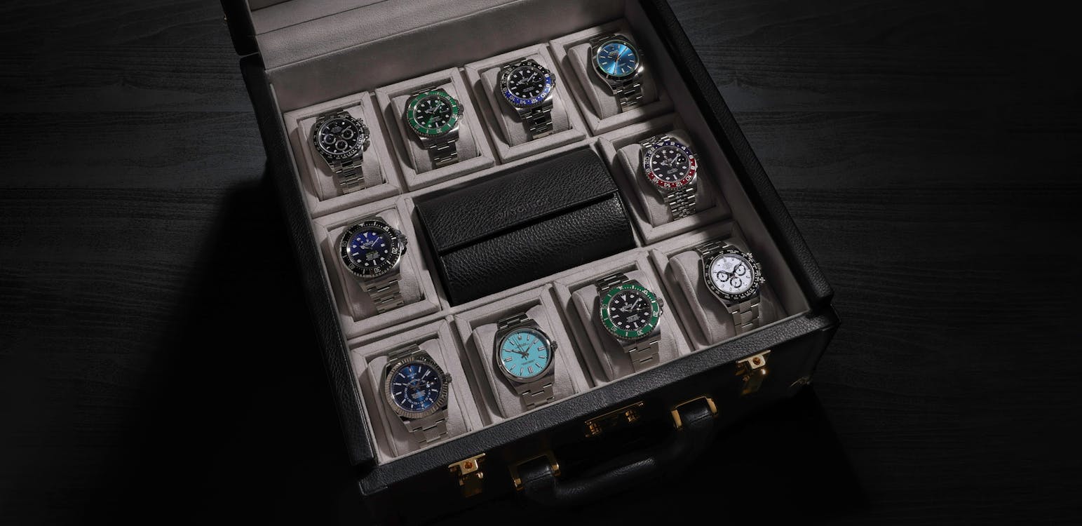 Open black leather watchbox containing the ten feautured Impossible Collection watches