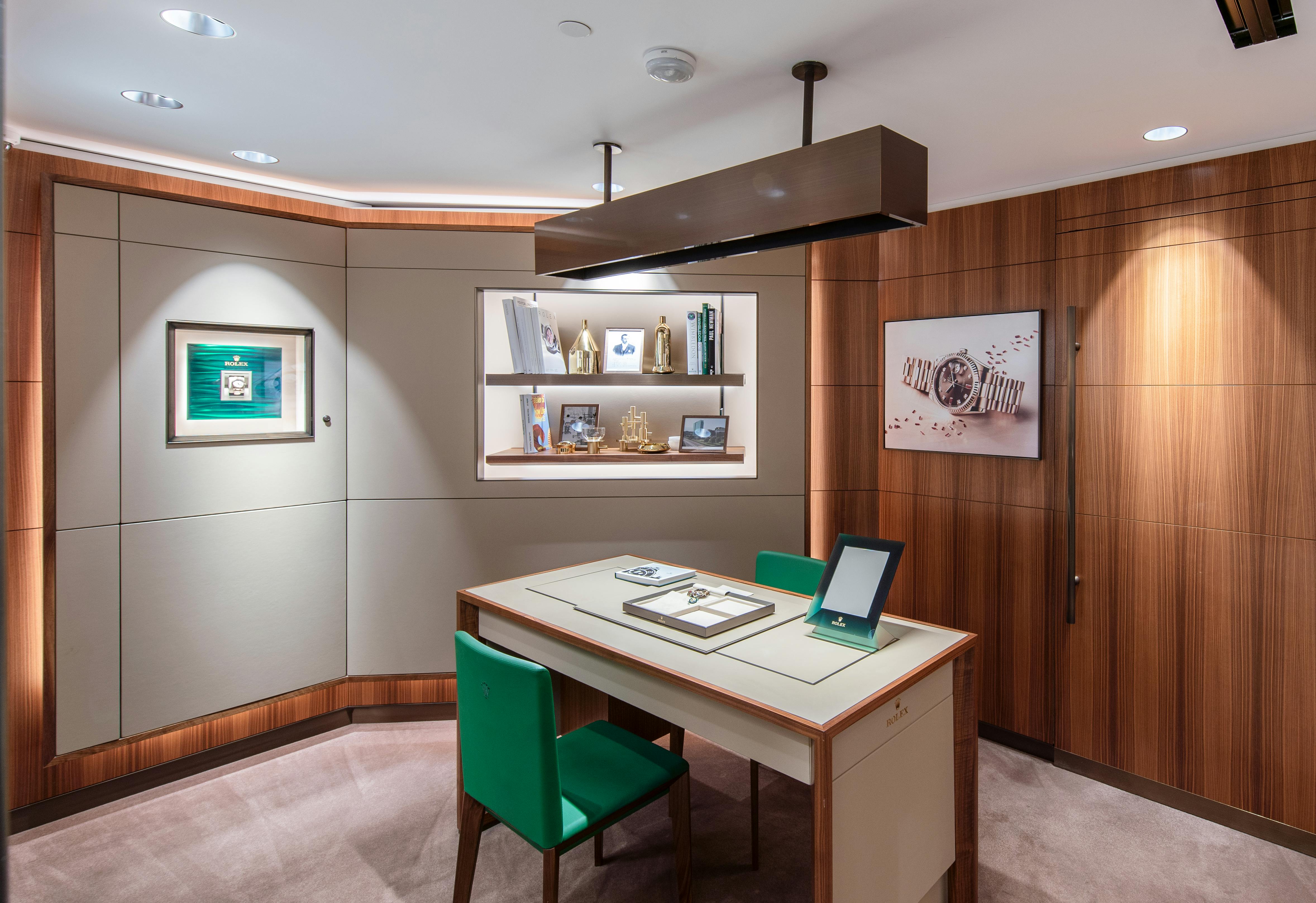 Interior view of the Rolex showroom at The 1916 Company (Hyde Park Jewelers) in Denver, showcasing luxury watches.