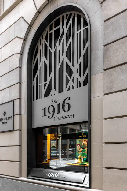 The 1916 Company Rolex and Patek Philippe authorized dealer storefront on Walnut Street Philadelphia with historic stone arch facade