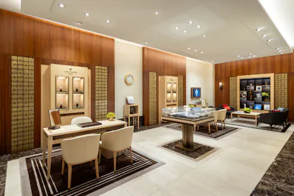 Interior of The 1916 Company store showcasing a dedicated Patek Philippe watch display area with elegant cabinetry.