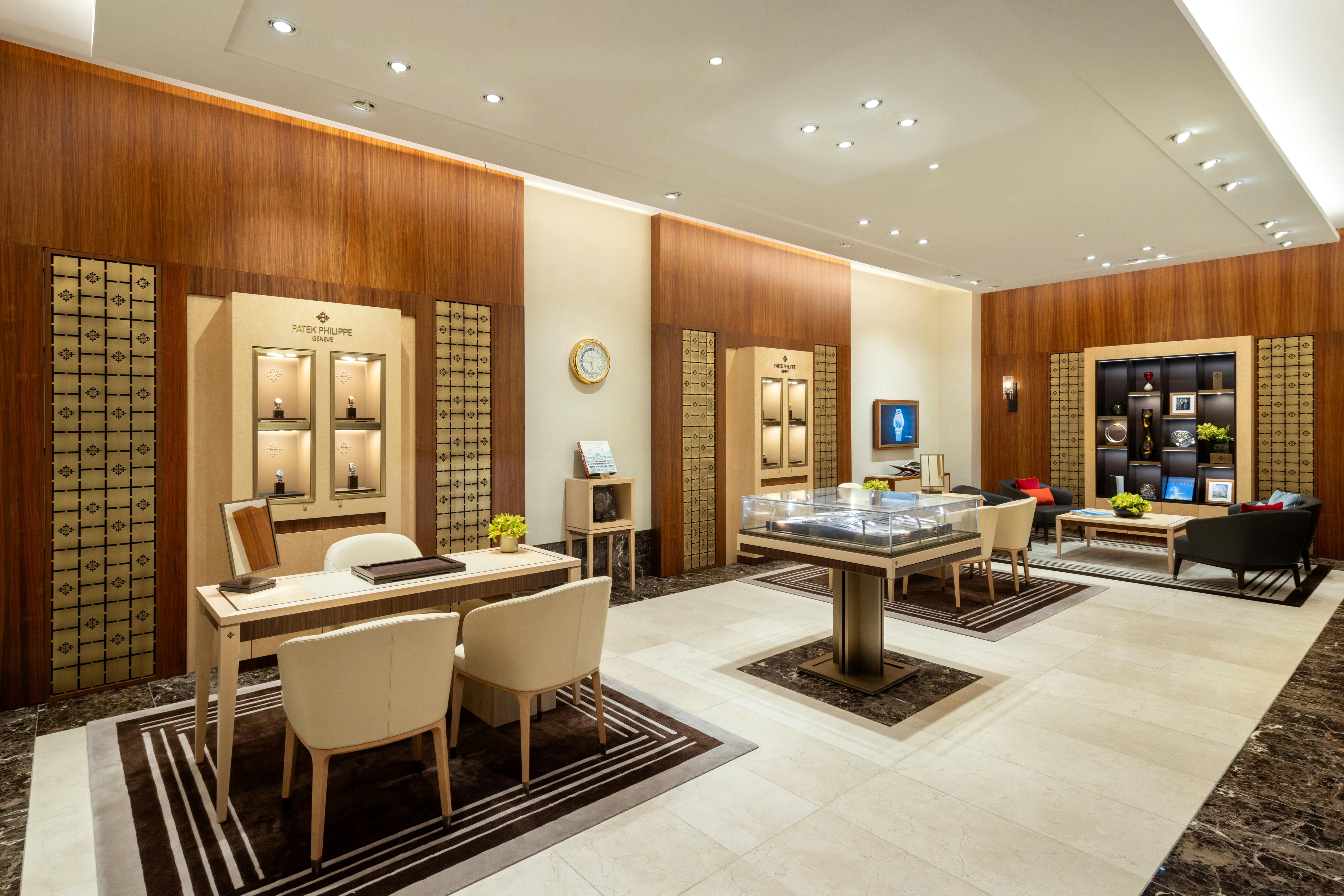 Interior of The 1916 Company store showcasing a dedicated Patek Philippe watch display area with elegant cabinetry.